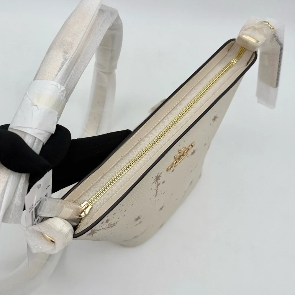 Coach Logan Duffle Bag With Star Print Chalk Cream